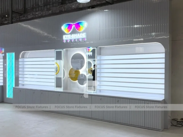 Concept White Eyewear Store Concept with Branded Rail Wall