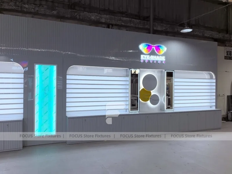 Concept White Eyewear Store Concept with Branded Rail Wall