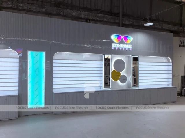 Concept White Eyewear Store Concept with Branded Rail Wall