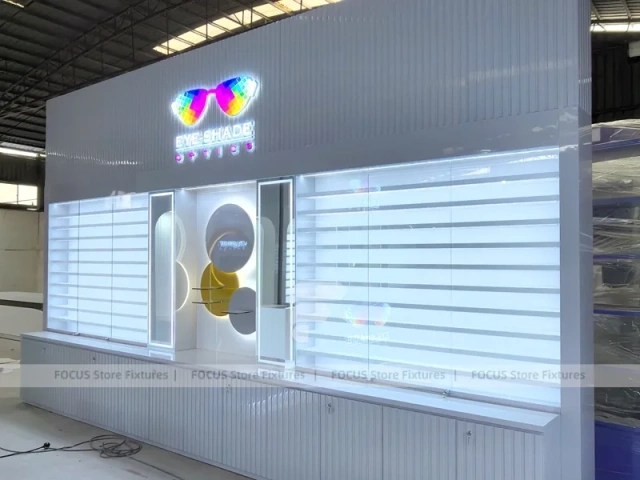 Concept White Eyewear Store Concept with Branded Rail Wall