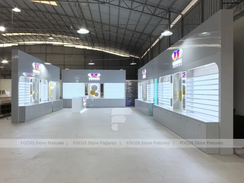 Concept White Eyewear Store Concept with Branded Rail Wall