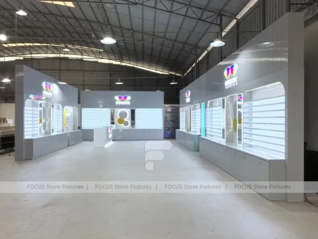 Concept White Eyewear Store Concept with Branded Rail Wall