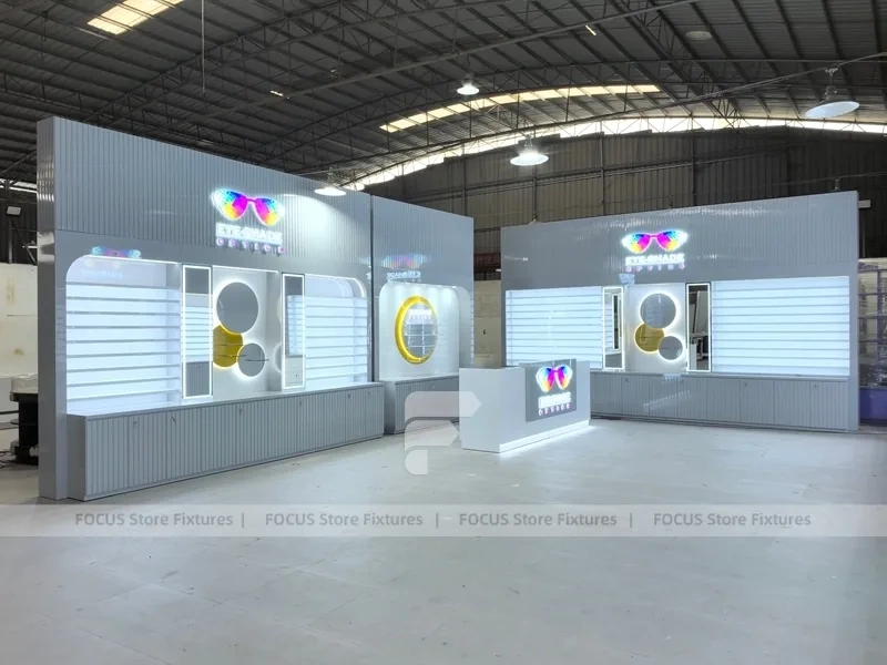 Concept White Eyewear Store Concept with Branded Rail Wall