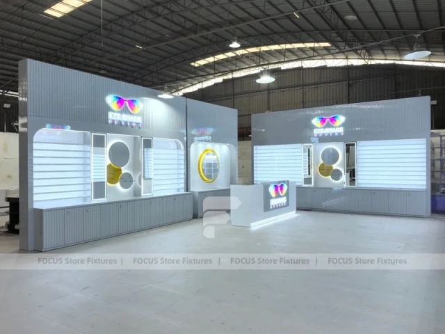 Concept White Eyewear Store Concept with Branded Rail Wall