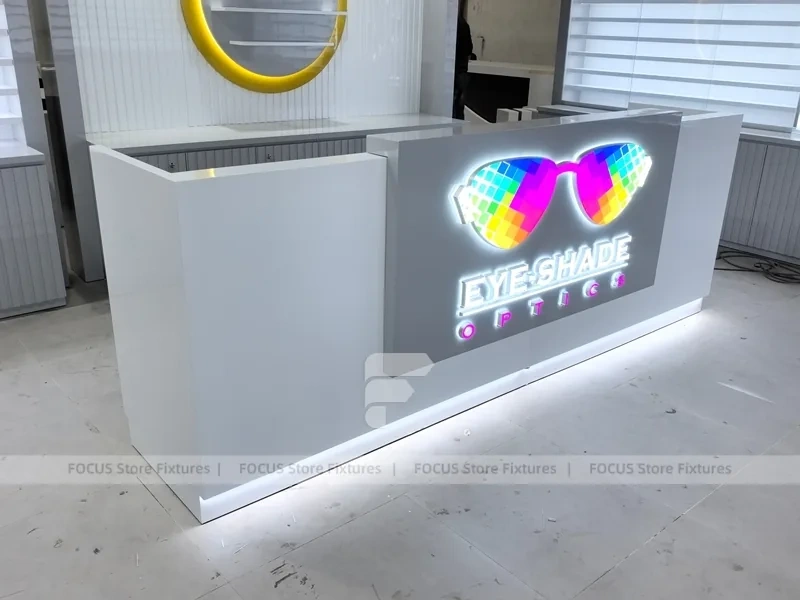Concept White Eyewear Store Concept with Branded Rail Wall