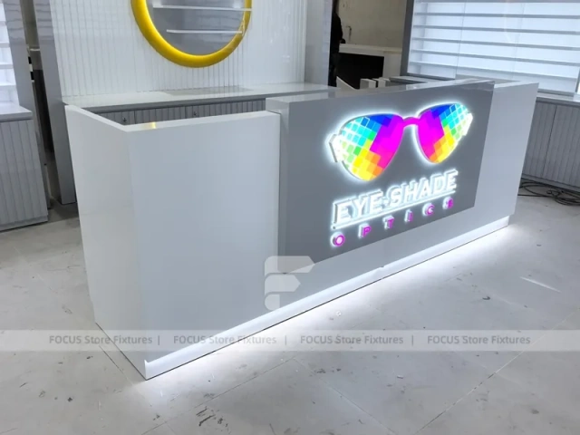 Concept White Eyewear Store Concept with Branded Rail Wall