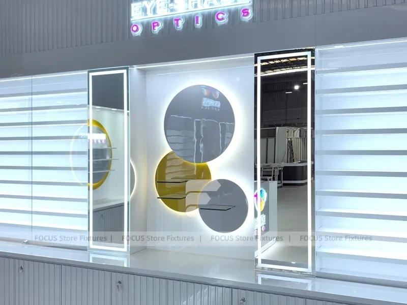Concept White Eyewear Store Concept with Branded Rail Wall