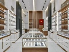 Contemporary White Eyewear Retail Layout with Modular Counter Cluster