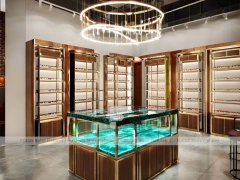 Emerald Luxe Eyewear Gallery Interior with Teal Framed Wall Display