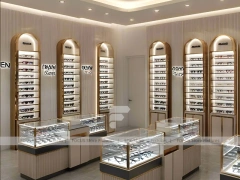 Gold Accent Optical Corridor Gallery with Slim Center Display Tables