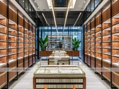 Gold Accent Optical Corridor Gallery with Warm Accent Facade