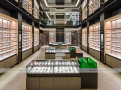 Gold Accent Optical Loft Gallery with Double-Height Display Grid