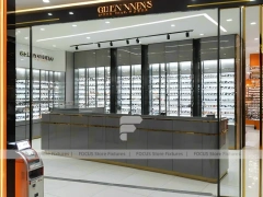 Golden Corridor Eyewear Boutique Hall with Warm Accent Facade