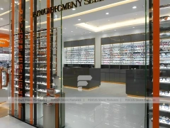 Golden Corridor Eyewear Boutique Hall with Warm Accent Facade