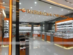 Golden Corridor Eyewear Boutique Hall with Warm Accent Facade