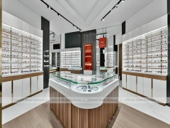 Modular White Eyewear Retail Layout with Black Core Tower