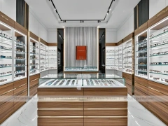Modular White Eyewear Retail Layout with Black Core Tower