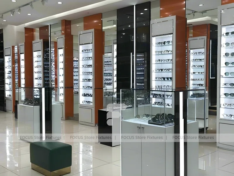 Orange Accent Eyewear Column Gallery with Illuminated Pillar Towers