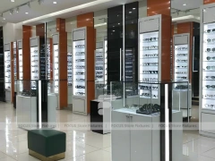 Orange Accent Eyewear Column Gallery with Illuminated Pillar Towers