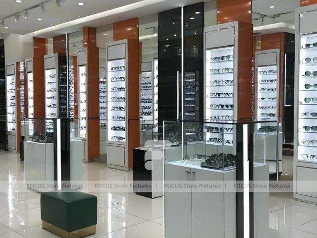 Orange Accent Eyewear Column Gallery with Illuminated Pillar Towers