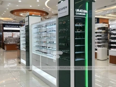 Orange Accent Vision Retail Zone with Illuminated Pillar Towers