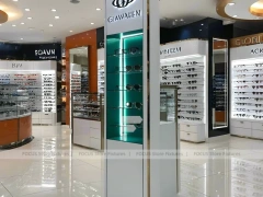 Orange Accent Vision Retail Zone with Illuminated Pillar Towers