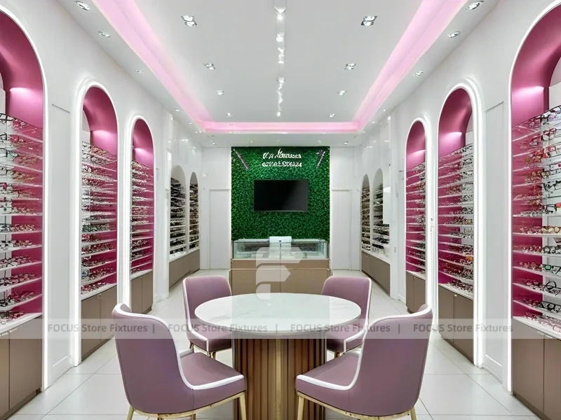 Pastel Blush Eyewear Styling Room with Round Pink Pedestals