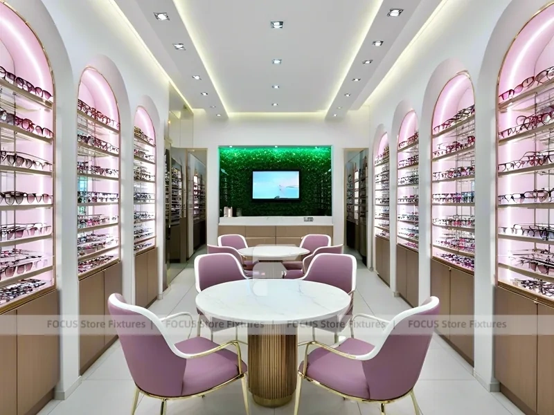 Pastel Blush Eyewear Styling Room with Round Pink Pedestals