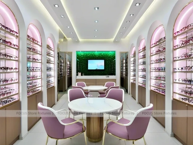 Pastel Blush Eyewear Styling Room with Round Pink Pedestals