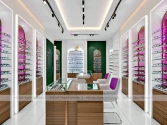 Pastel Blush Eyewear Styling Room with Round Pink Pedestals