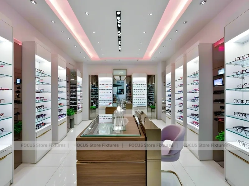Pastel Blush Eyewear Styling Room with Round Pink Pedestals