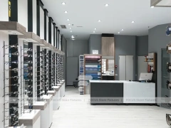 Pastel Mint Eyewear Retail Interior with Rounded Entry Portal