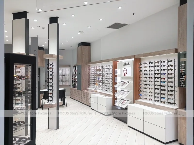 Pastel Mint Eyewear Retail Interior with Rounded Entry Portal