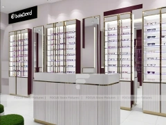 Plum Accent Eyewear Wall Gallery with Plum Vertical Panels