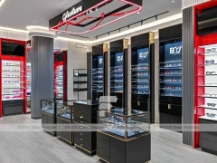 Red Accent Optical Concept Store with High-Contrast Wall Display