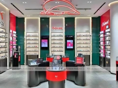 Red Neon Vision Retail Stage with Racing-Inspired Ceiling Feature
