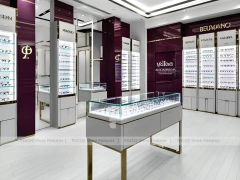 Soft Plum Optical Boutique Display with Green Accent Tower