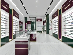 Soft Plum Optical Boutique Display with Green Accent Tower