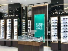 Teal Accent Optical Statement Boutique with Teal Framed Wall Display