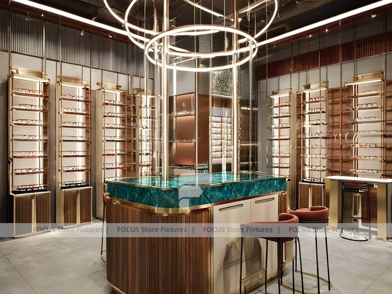 Teal Gold Eyewear Gallery Interior with Chandelier-Lit Island