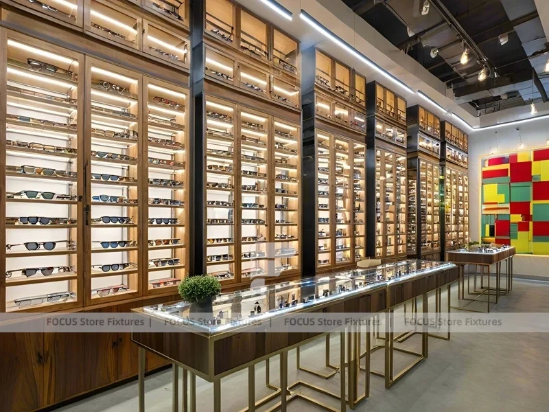Teal Gold Eyewear Gallery Interior with Chandelier-Lit Island