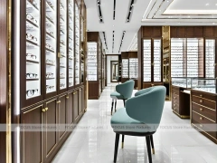 Teal Gold Vision Retail Showcase with Chandelier-Lit Island