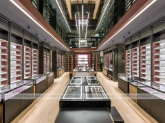 Urban Steel Eyewear Urban Showroom with Double-Height Display Grid