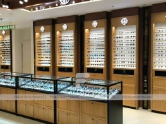 Warm Bronze Vision Retail Passage for Premium Eyewear Boutique