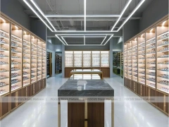 Warm Bronze Vision Retail Passage for Premium Eyewear Boutique