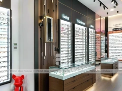 Wood and Emerald Vision Boutique Corridor with Suspended Display Frames