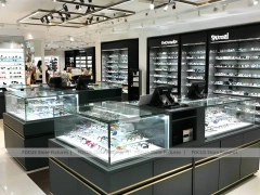 Wood and White Eyewear Retail Layout with White Wood Showcase Islands