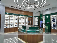 Woodgrain Optical Boutique Display with Circular Center Showcase