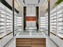 Woodgrain Optical Display Corridor with Red Accent Portal