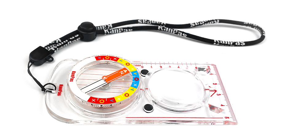 Orienteering compass with liquid-filled capsule for smooth needle movement.